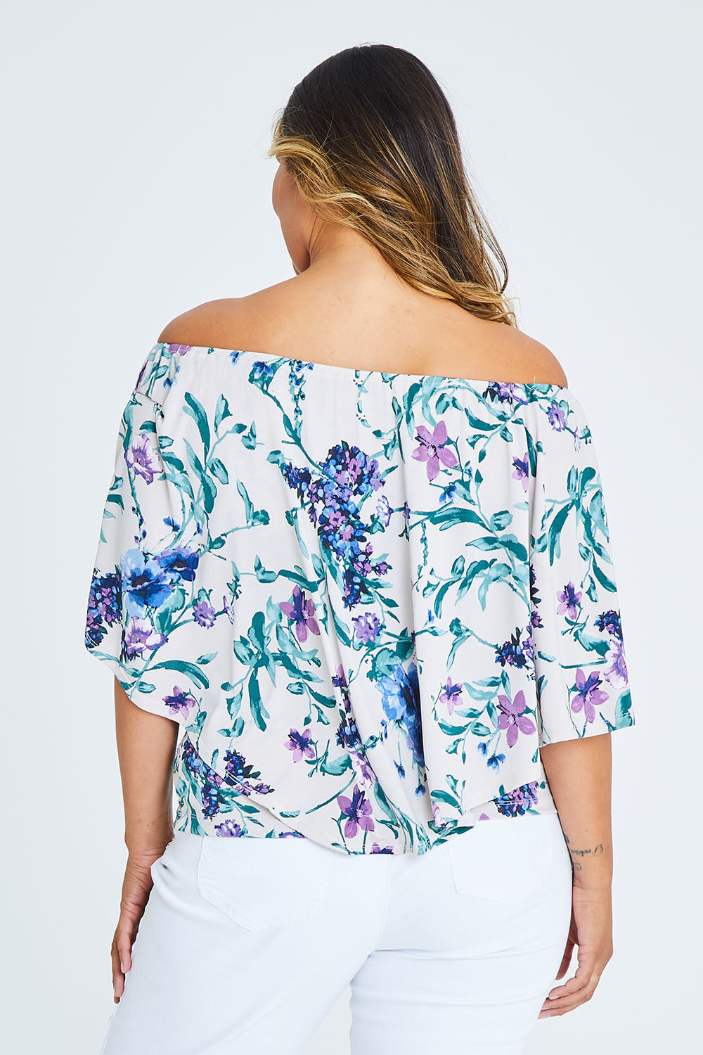Model Palatina wearing size 16 of the Belle Lavender Floral Top in colour Lavender (Purple), from the back