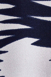 Product shot of the Belle Printed Throw Over in colour Strokes (Blue), detail