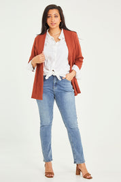 Model Terri-Leigh wearing size 14 of the Belle Long Line Ponte Jacket in colour Ochre, from the front, showing the whole outfit