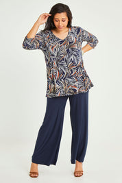 Model Terri-Leigh wearing size 14 of the Belle Jersey Tee With Pocket Detail in colour Navyprint (Blue), from the front, showing the whole outfit