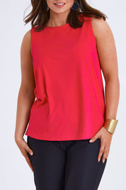 Model Monique wearing size 14 of the Belle Luxe Bamboo Tank in colour Lipstick (Pink), from the front, cropped image
