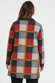 Model Laura wearing size 14 of the Belle Roll Neck Tunic in colour Multiprint (Grey), from the back