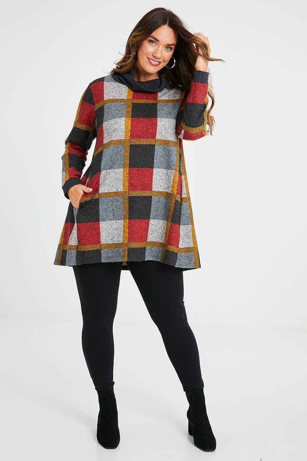 Model Laura wearing size 14 of the Belle Roll Neck Tunic in colour Multiprint (Grey), from the front, showing the whole outfit