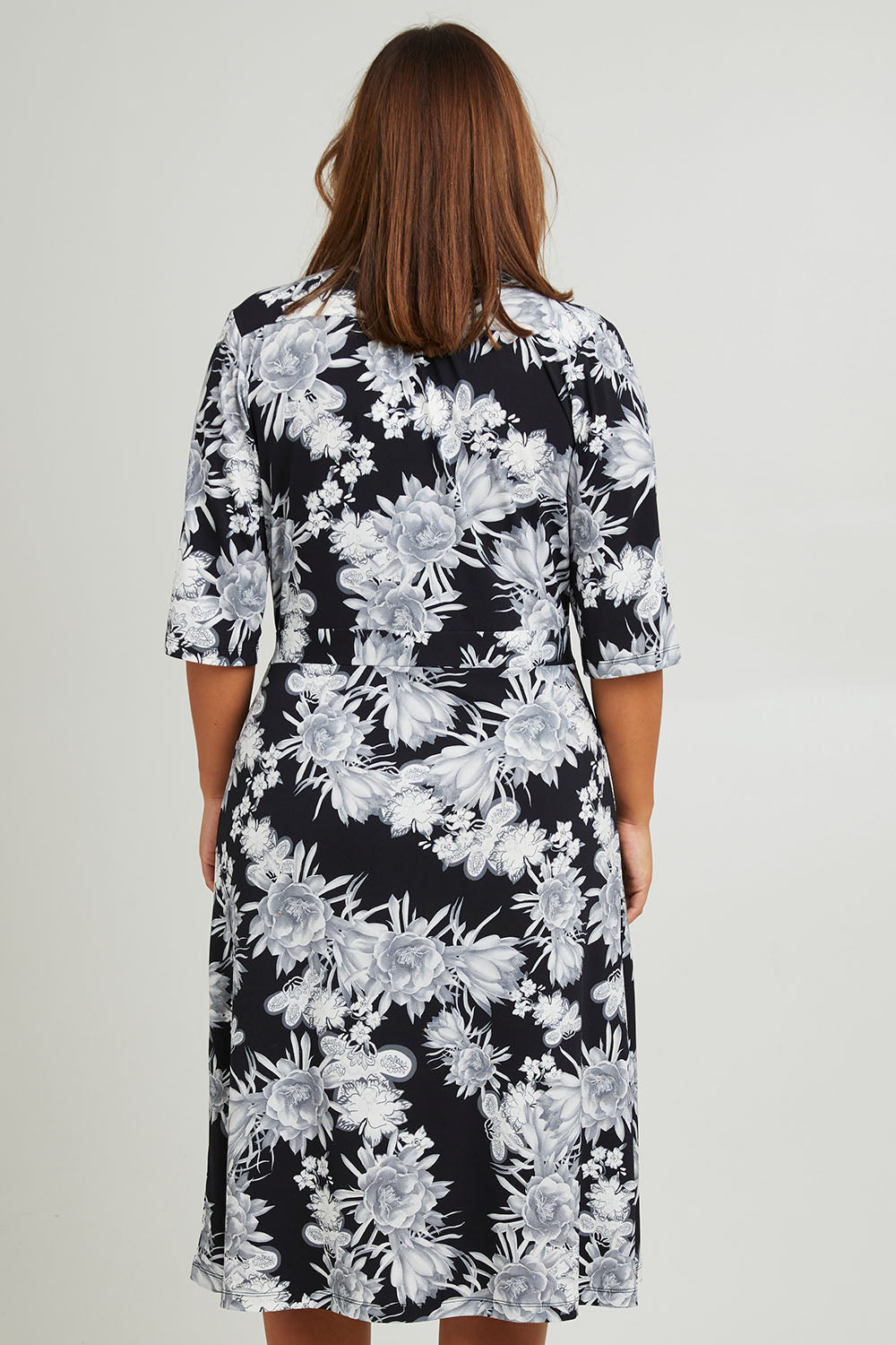 Model Monique wearing size 14 of the Belle Classic Full Skirt Dress in colour Blackgrey (Black), from the back