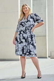 Model Monique wearing size 14 of the Belle Classic Full Skirt Dress in colour Blackgrey (Black), from the front, showing the whole outfit