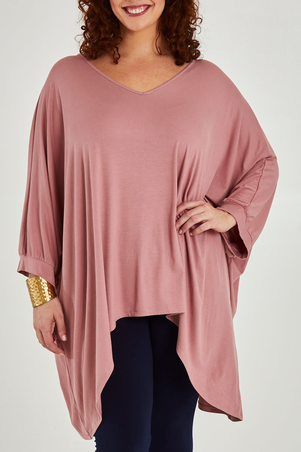 Model Maddy wearing size 16 of the Belle Goddess Cotton Tee in colour Blush (Pink), from the front, cropped image
