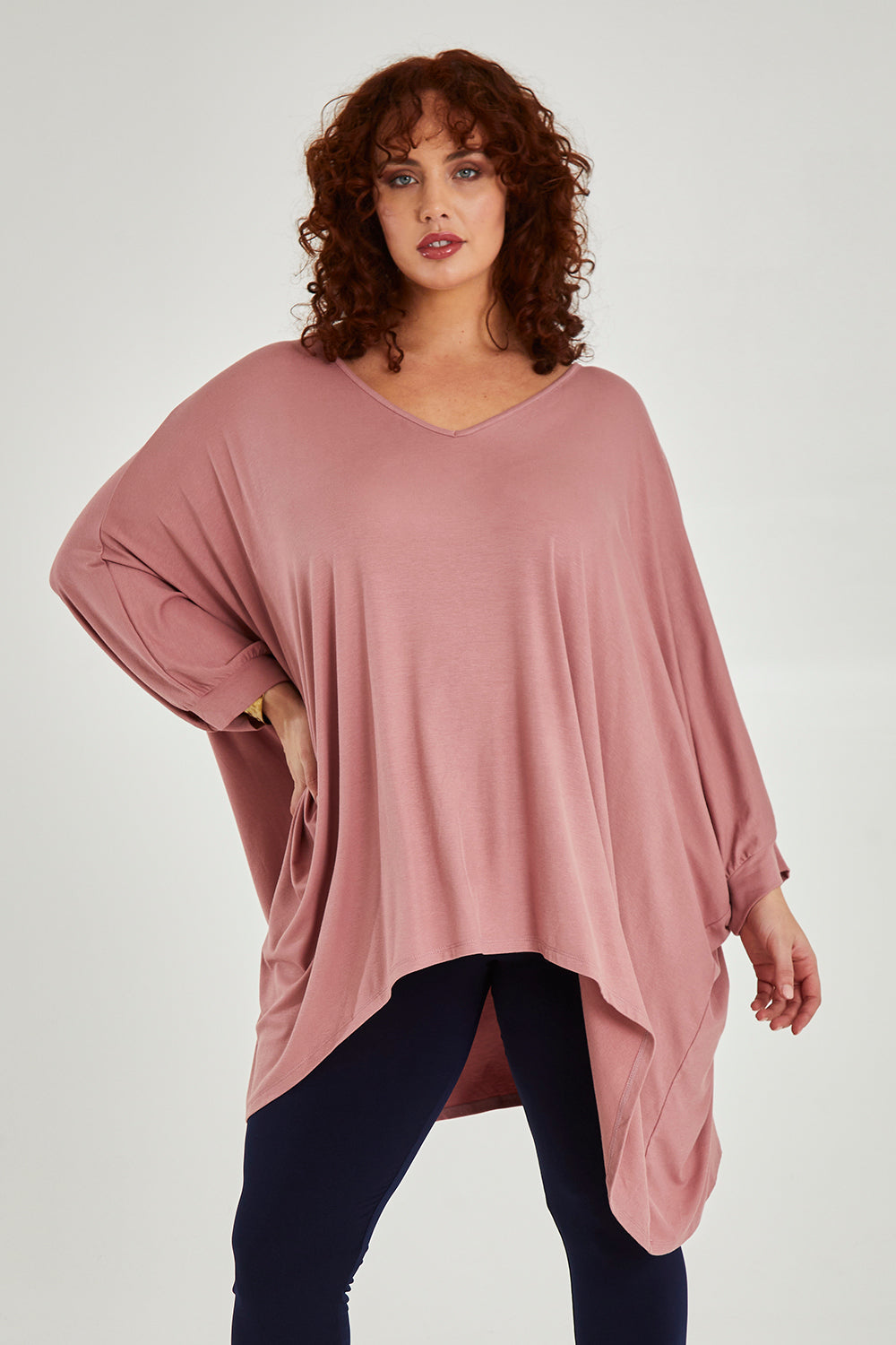 Model Maddy wearing size 16 of the Belle Goddess Cotton Tee in colour Blush (Pink), from the front, showing the whole outfit