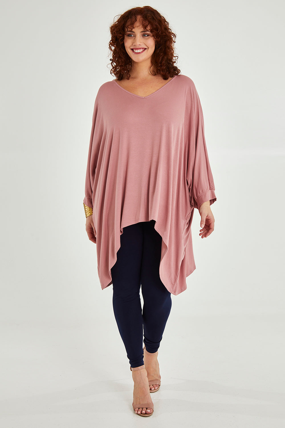 Model Maddy wearing size 16 of the Belle Goddess Cotton Tee in colour Blush (Pink), from the front, showing the whole outfit