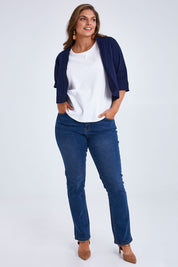 Model Monique wearing size 14 of the Belle Cotton Sateen Cropped Jacket in colour Navy (Blue), from the front, showing the whole outfit
