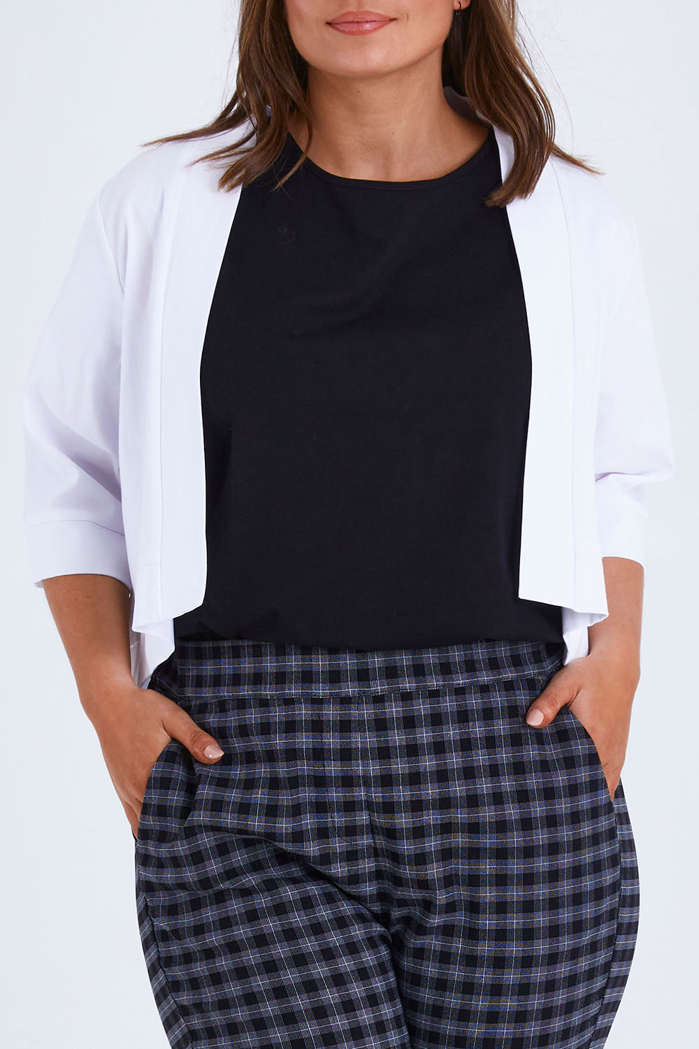 Model Monique wearing size 14 of the Belle Cotton Sateen Cropped Jacket in colour White (White), from the front, cropped image