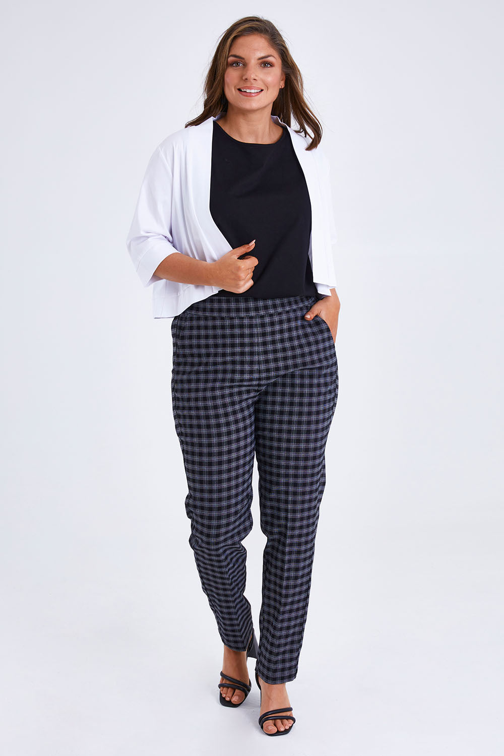 Model Monique wearing size 14 of the Belle Cotton Sateen Cropped Jacket in colour White (White), from the front, showing the whole outfit