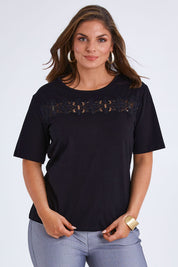 Model Monique wearing size 14 of the Belle Lace Insert Tee in colour Black (Black), from the front, cropped image