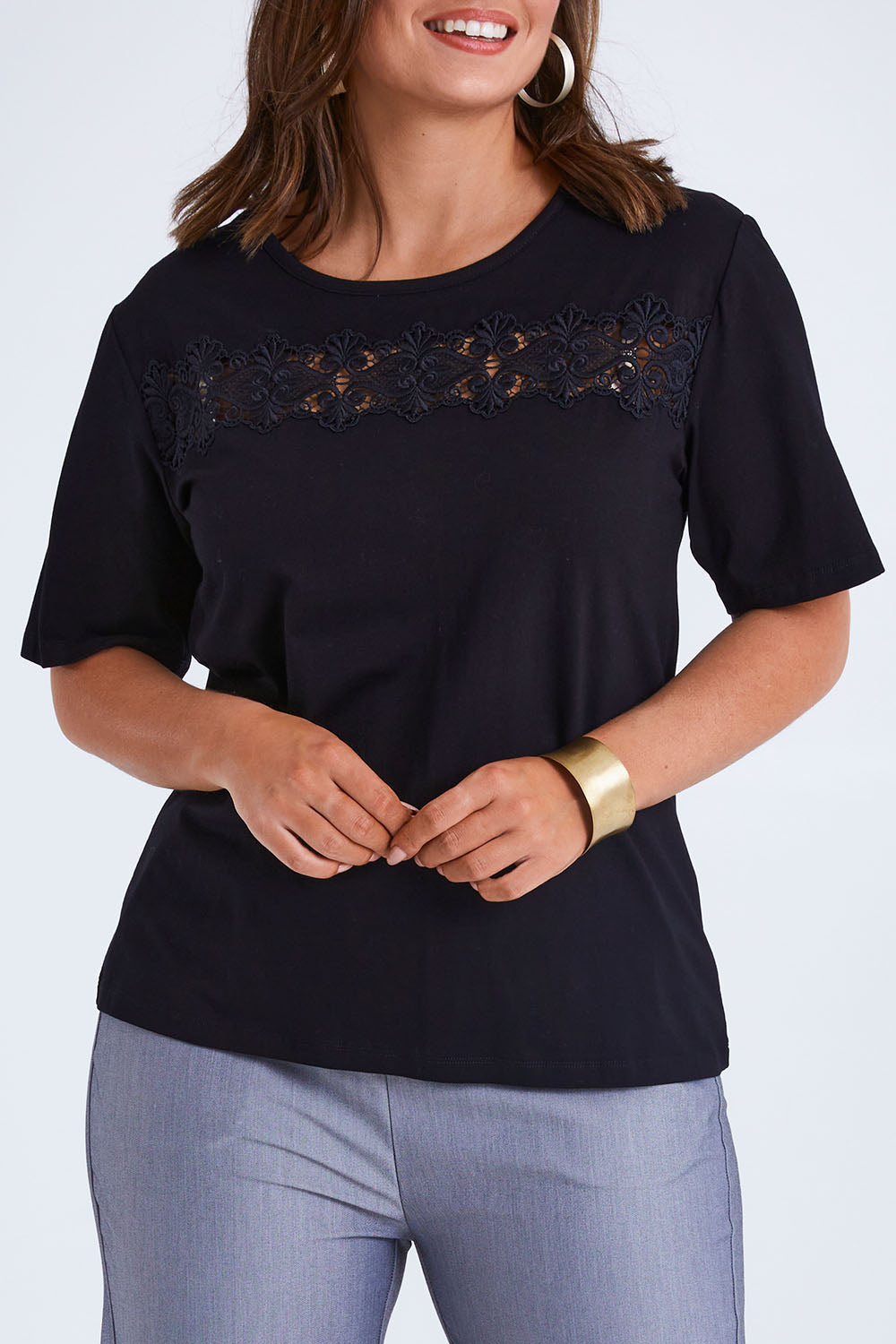Model Monique wearing size 14 of the Belle Lace Insert Tee in colour Black (Black), from the front, cropped image