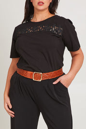 Model Poppy wearing size 16 of the Belle Lace Insert Tee in colour Black (Black), from the front, cropped image