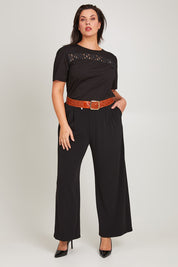 Model Poppy wearing size 16 of the Belle Lace Insert Tee in colour Black (Black), from the front, showing the whole outfit