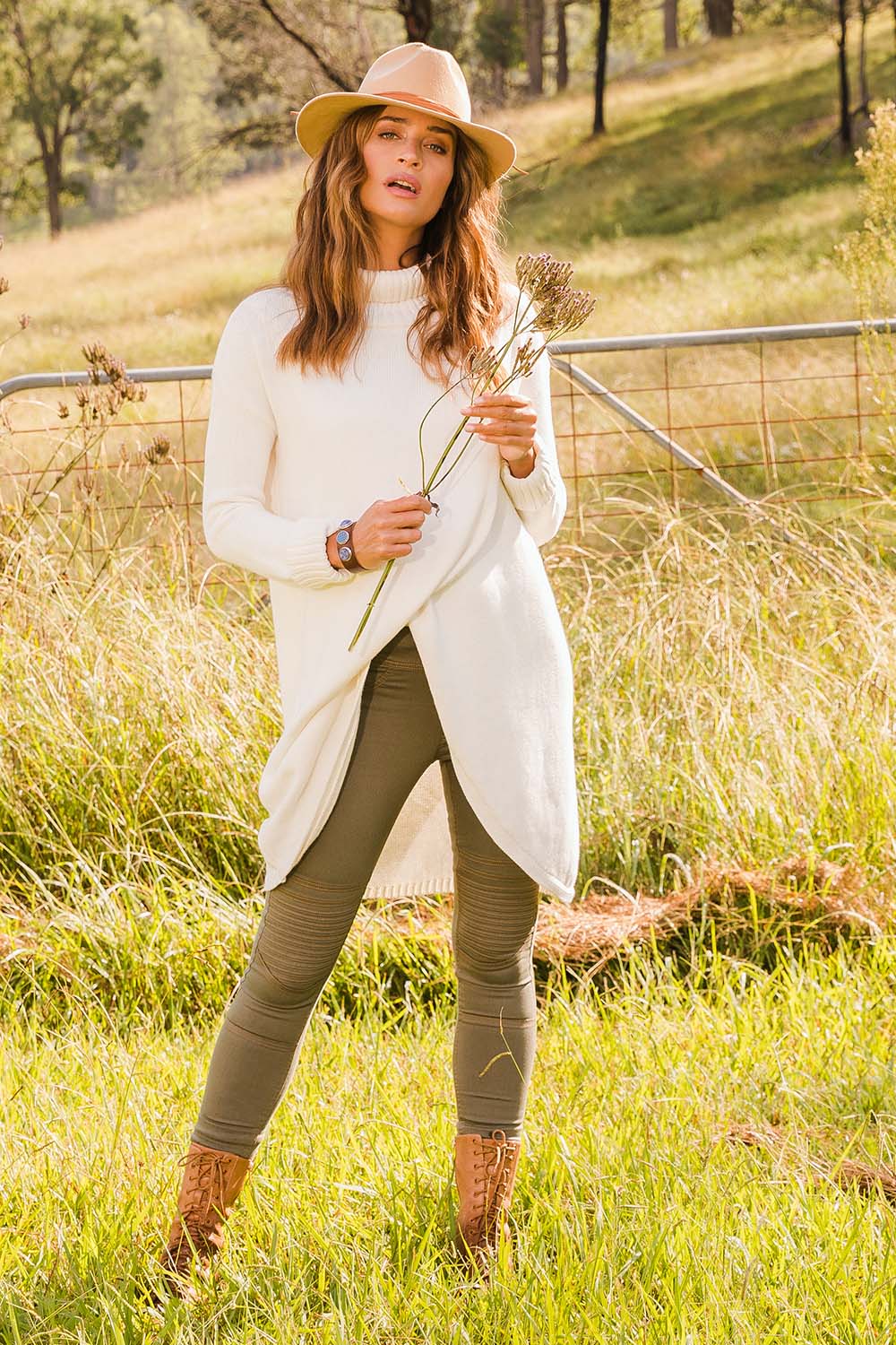 Model Ilona wearing size 10 of the Wild Heart Stitched Jeggings in colour Khaki (Green), from the front, showing the whole outfit