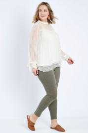 Model Jess wearing size 14 of the Wild Heart Stitched Jeggings in colour Khaki (Green), from the front, showing the whole outfit