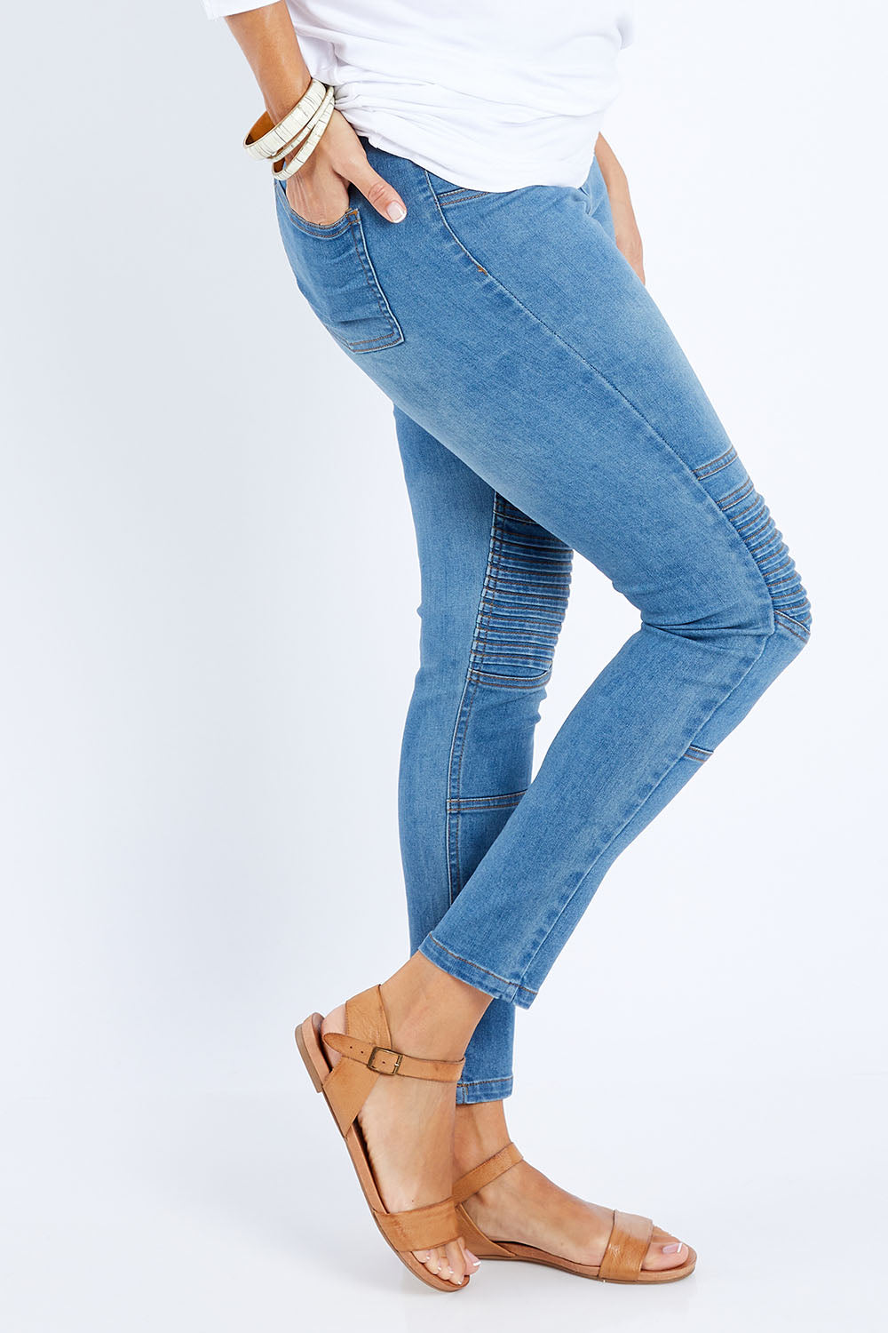 Model Lala wearing size 10 of the Wild Heart Stitched Jeggings in colour Lightdenim (Blue), from the front, cropped image