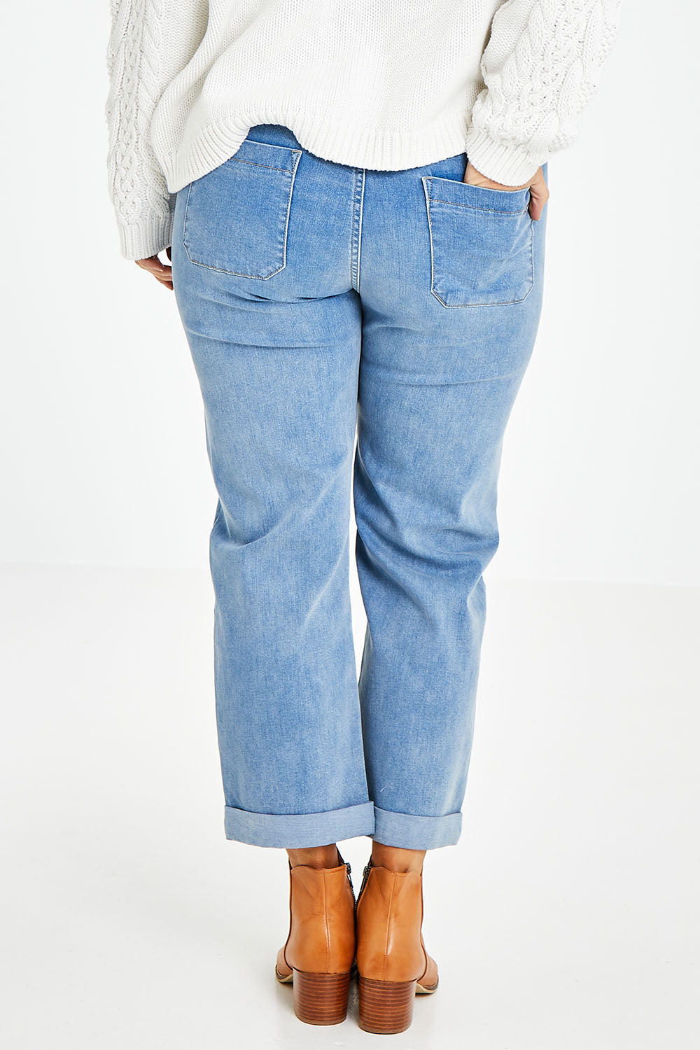 Model Laura wearing size 14 of the Patch You Up Slouch Jeans in colour Denimblue (Blue), from the back