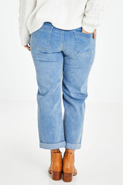 Model Laura wearing size 14 of the Patch You Up Slouch Jeans in colour Denimblue (Blue), from the back