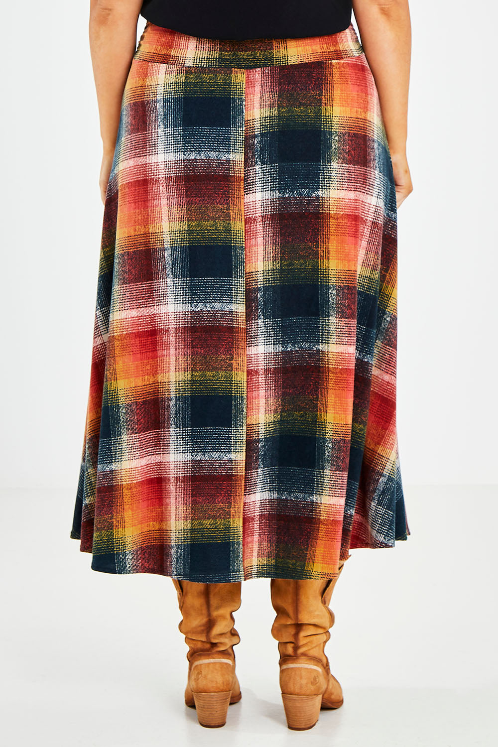 Model Jess wearing size 14 of the Chasing The Clouds Away Maxi Skirt in colour Sunset (Black), from the back