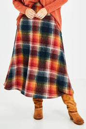 Model Jess wearing size 14 of the Chasing The Clouds Away Maxi Skirt in colour Sunset (Black), from the front, cropped image