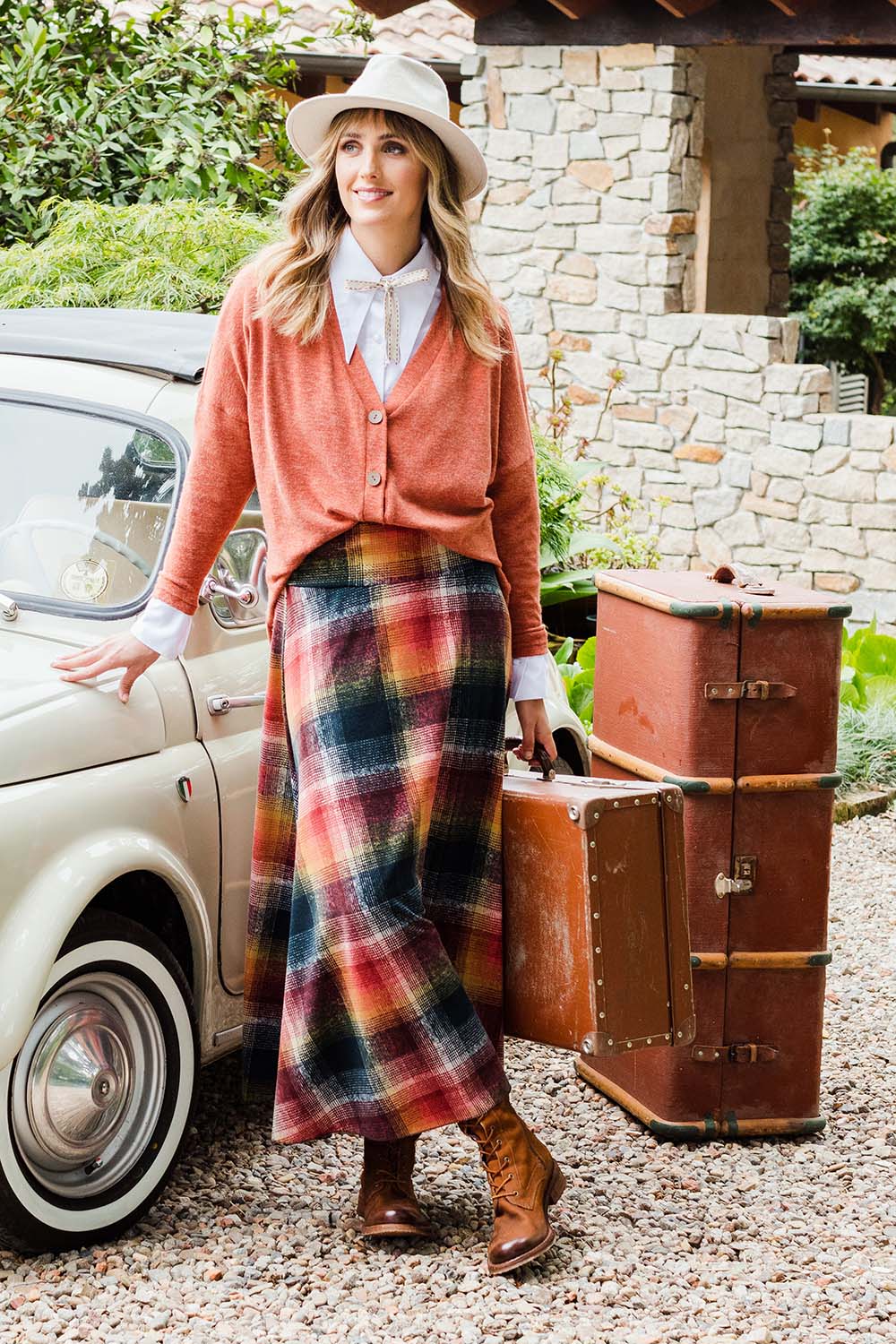 Model Tegan wearing size 10 of the Chasing The Clouds Away Maxi Skirt in colour Sunset (Black), from the front, showing the whole outfit