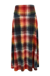 Product shot of the Chasing The Clouds Away Maxi Skirt in colour Sunset (Black), from the front