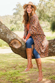 Model Ilona wearing the Got You Covered Throw Cardi in colour Ditsy, from the front, showing the whole outfit