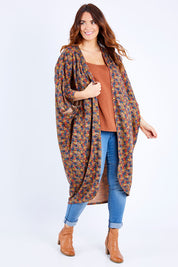 Model Laura wearing the Got You Covered Throw Cardi in colour Ditsy, from the front, showing the whole outfit