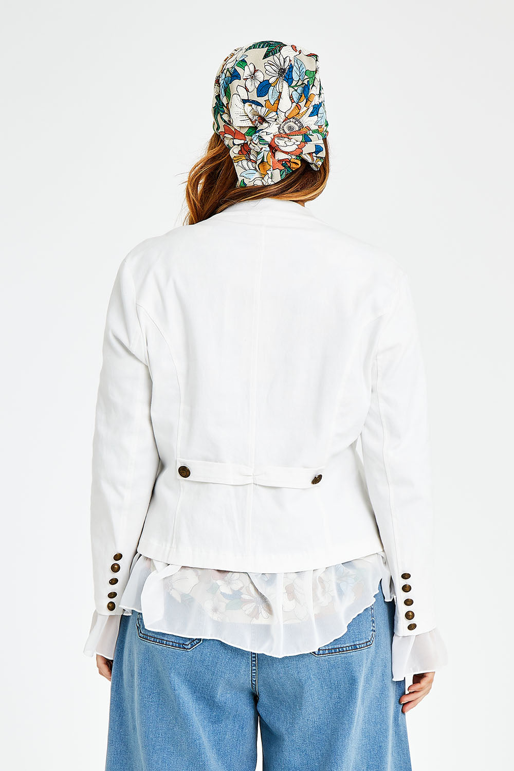 Model Laura wearing size 14 of the Commander Of Love Jacket in colour Milk (White), from the back