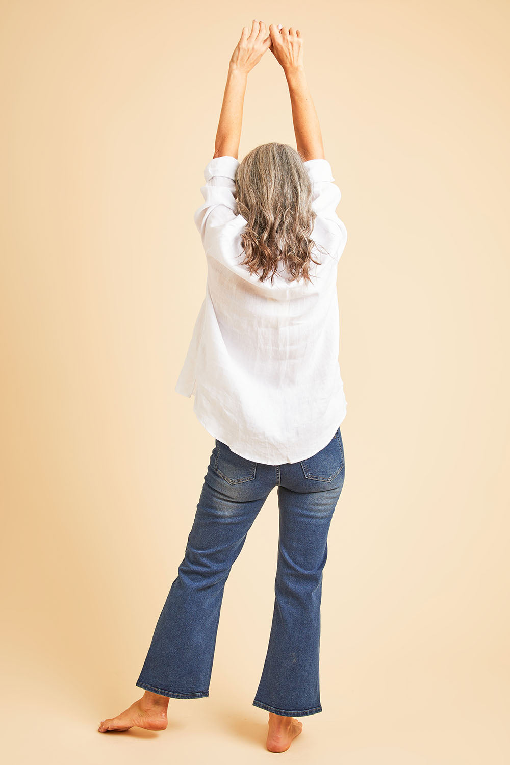 Model Luisa wearing size 10 of the Easy As Pull On Jeans in colour Darkdenim (Blue), from the front, showing the whole outfit