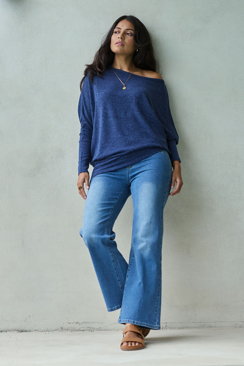Model Tahnee wearing size 10 of the Easy As Pull On Jeans in colour Denim (Blue), from the front, showing the whole outfit