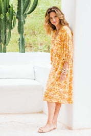 Model Ilona wearing size 12 of the Meadow Walks Wrap Dress in colour Sunshine, from the front, showing the whole outfit
