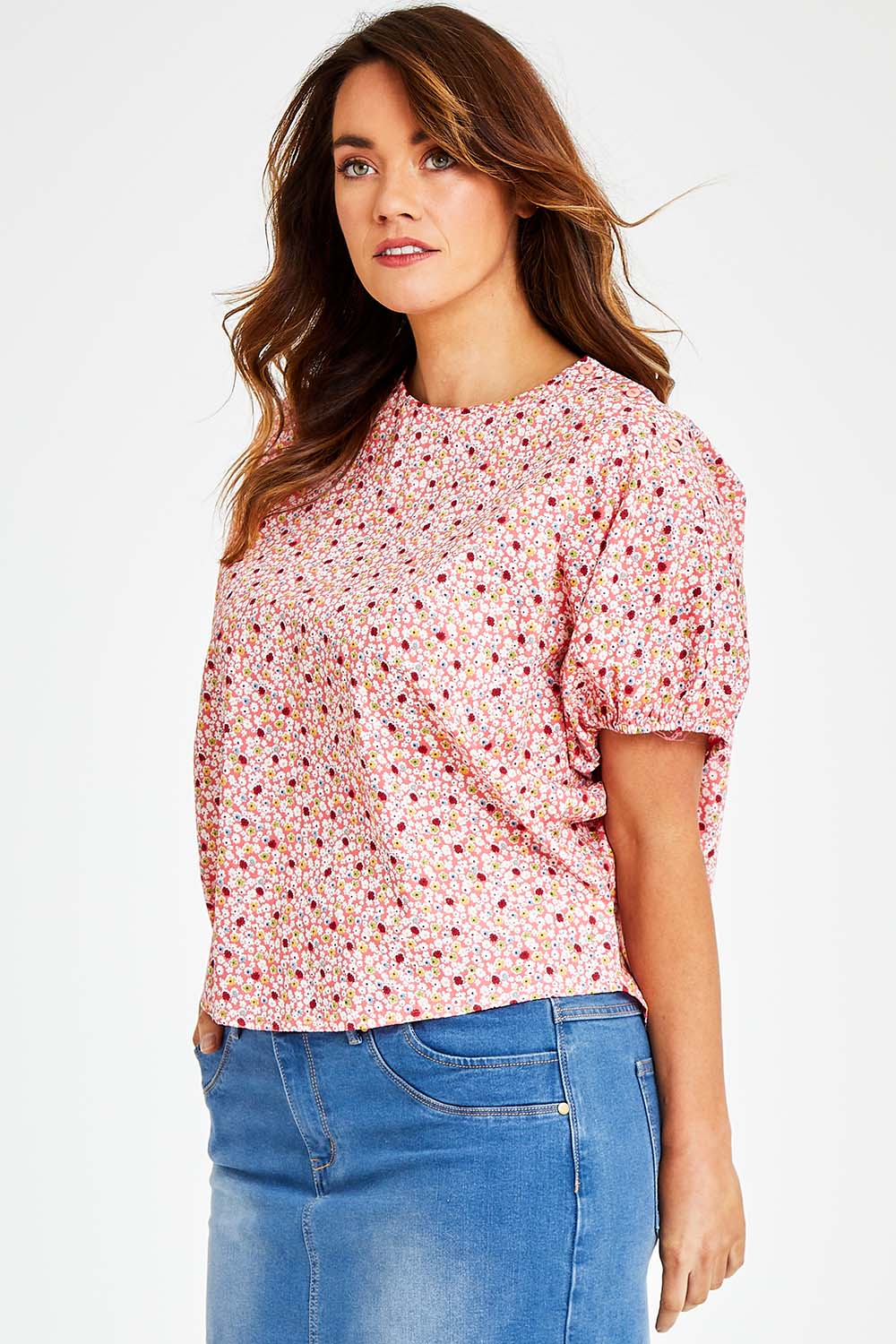 Model Laura wearing size 14 of the Its All In The Sleeve Cotton Blouse in colour Peach (Pink), from the front, cropped image