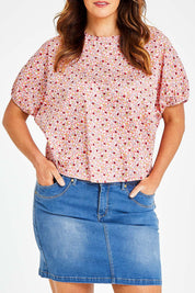 Model Laura wearing size 14 of the Its All In The Sleeve Cotton Blouse in colour Peach (Pink), from the front, cropped image