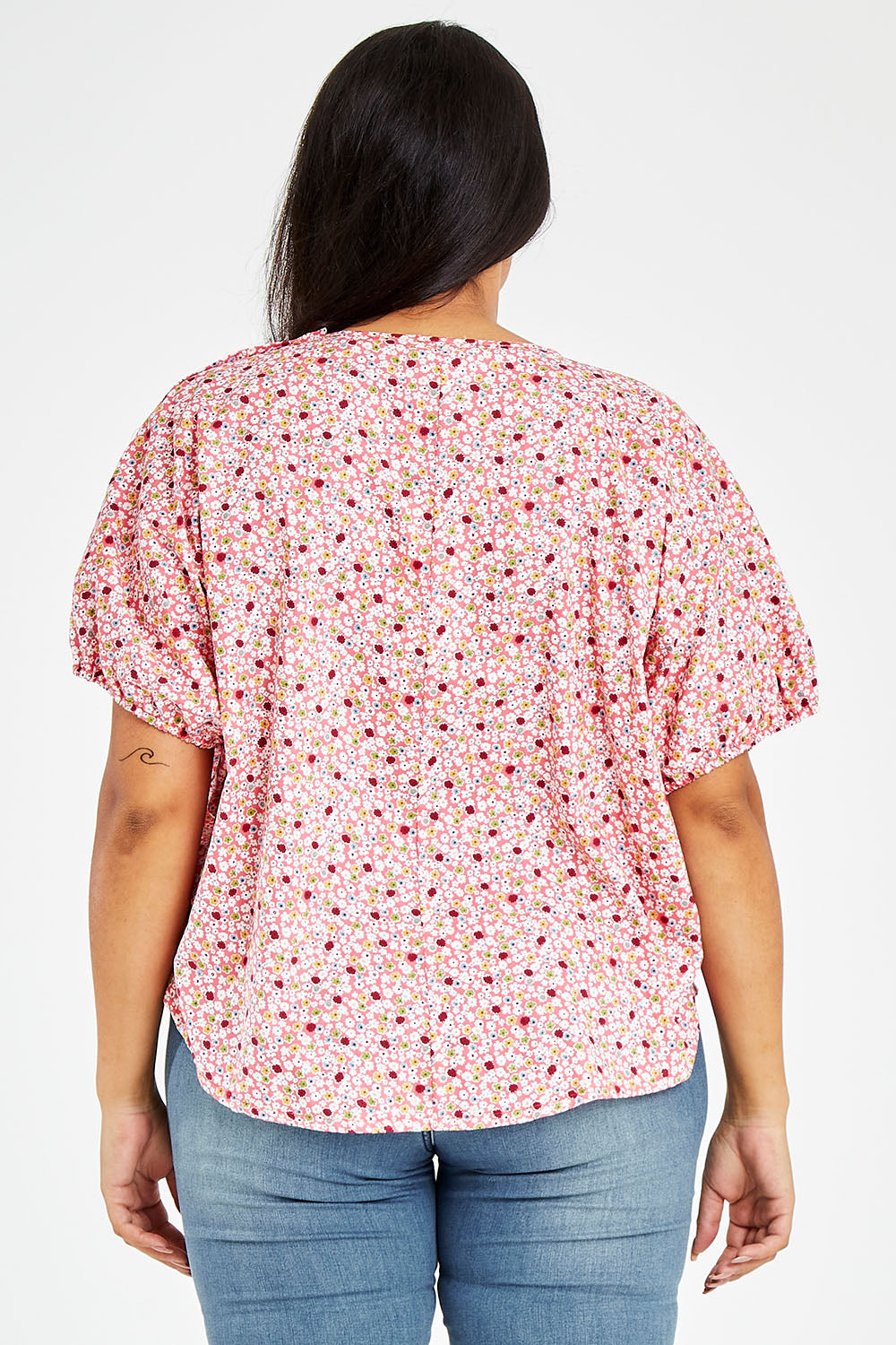 Model Sasha-Lee wearing size 16 of the Its All In The Sleeve Cotton Blouse in colour Peach (Pink), from the back