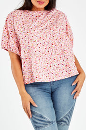 Model Sasha-Lee wearing size 16 of the Its All In The Sleeve Cotton Blouse in colour Peach (Pink), from the front, cropped image