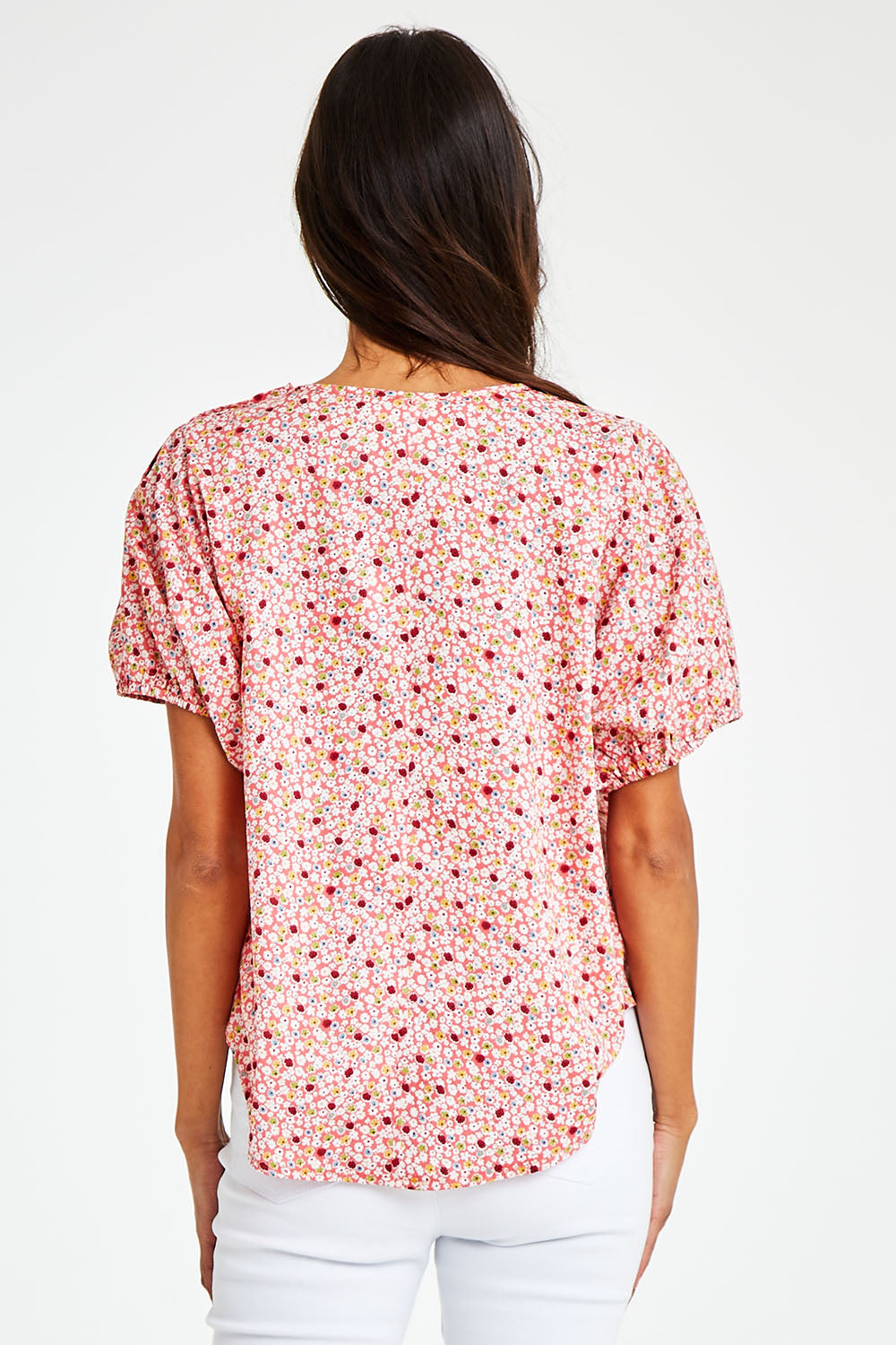 Model Vitoria wearing size 10 of the Its All In The Sleeve Cotton Blouse in colour Peach (Pink), from the back