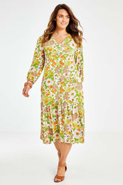 Model Laura wearing size 14 of the Daisy Chain Love Maxi Dress in colour Daisy (White), from the front, showing the whole outfit