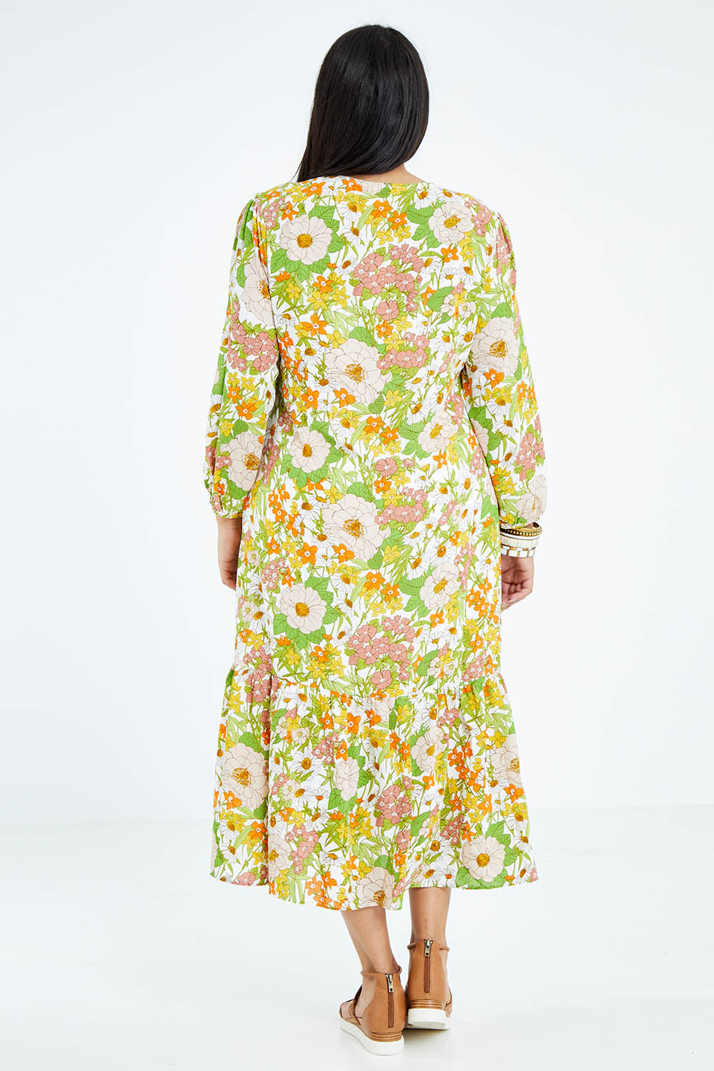 Model Sasha-Lee wearing size 16 of the Daisy Chain Love Maxi Dress in colour Daisy (White), from the back