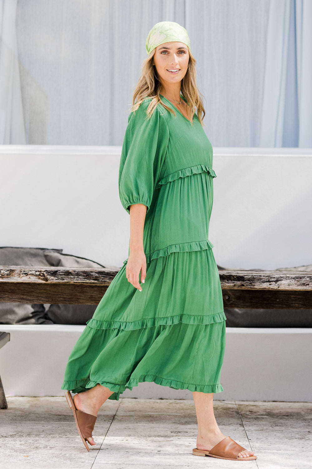 Model Tegan wearing size 10 of the Tiers Of Laughter Maxi Dress in colour Emerald (Green), from the front, showing the whole outfit