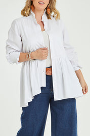 Model Jess wearing size 14 of The Frill You Give Me Blouse in colour White (White), from the front, cropped image