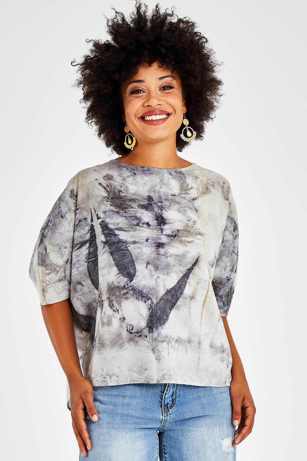 Model Olivia wearing size 10 of the With My Tribe Eco Printed Top in colour Ecoprint (Red), from the front, cropped image