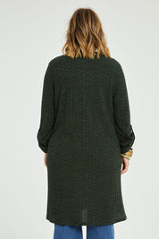 Model Jess wearing size 14 of the Into The Forest Cardi in colour Forest (Green), from the back