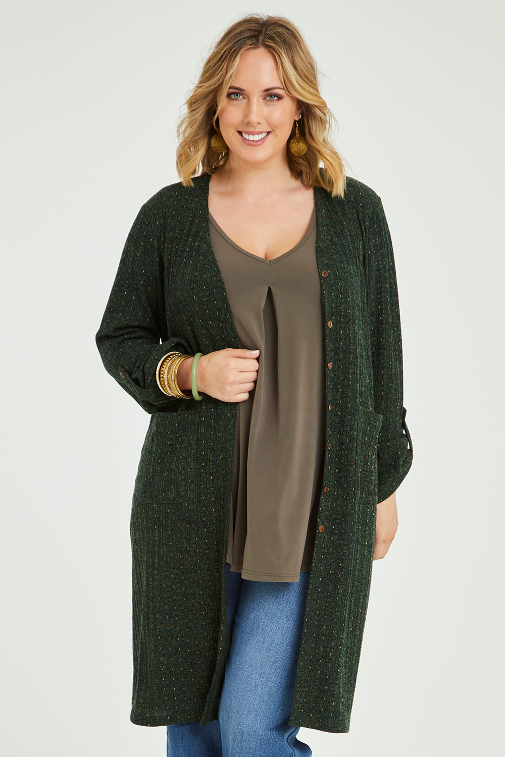 Model Jess wearing size 14 of the Into The Forest Cardi in colour Forest (Green), from the front, cropped image