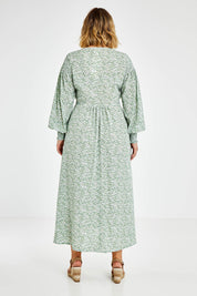 Model Jess wearing size 14 of the Field Of Dreams Button Up Dress in colour Greenfleur (Green), from the back