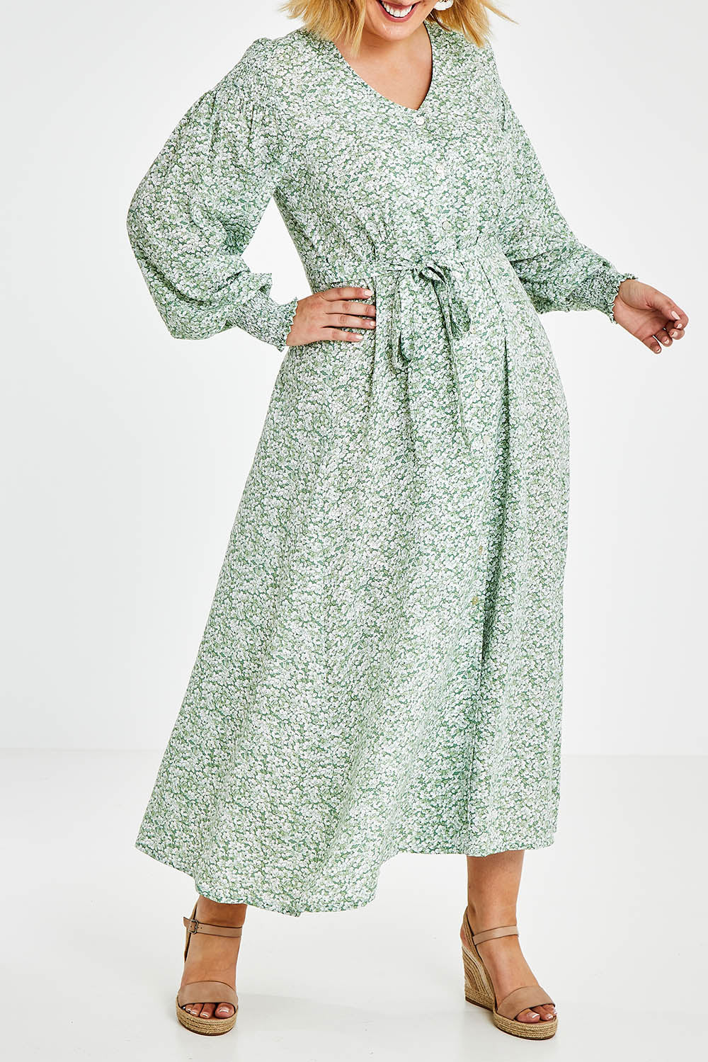 Model Jess wearing size 14 of the Field Of Dreams Button Up Dress in colour Greenfleur (Green), from the front, cropped image