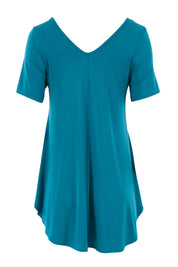 Product shot of the Softly Swinging Bamboo Tee in colour Jewel (Green), from the back