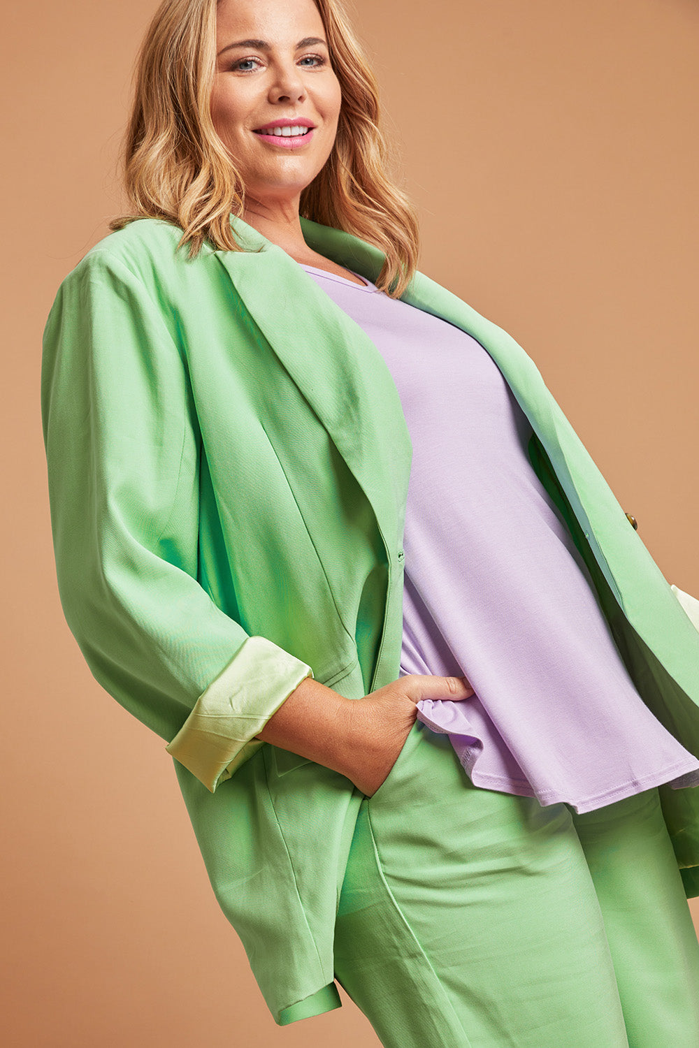Model Fiona wearing size 16 of the Softly Swinging Bamboo Tee in colour Lilac (Purple), from the front, showing the whole outfit